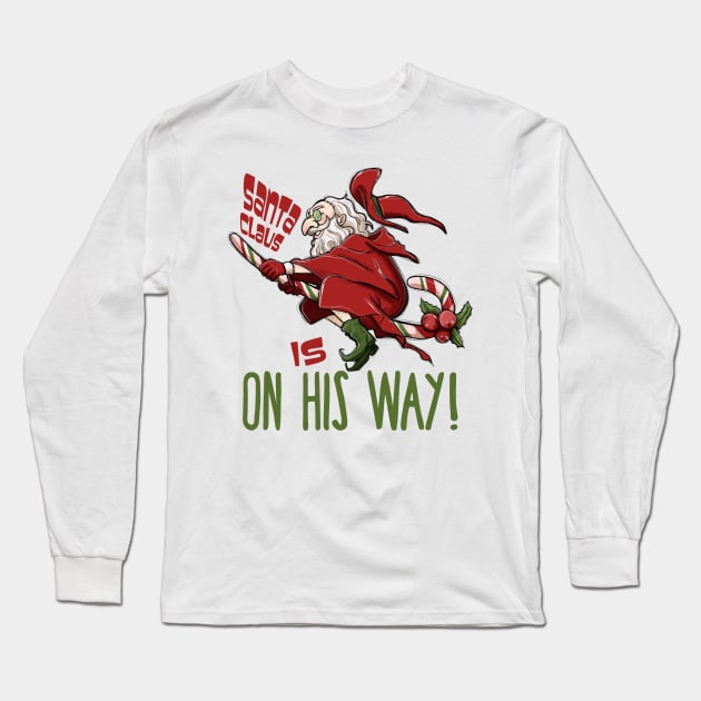 Santa Claus Witch Flying on Candy Cane Long Sleeve T-Shirt by Luxinda